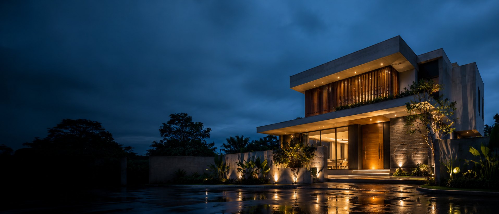Residência contemporânea iluminada ao anoitecer
